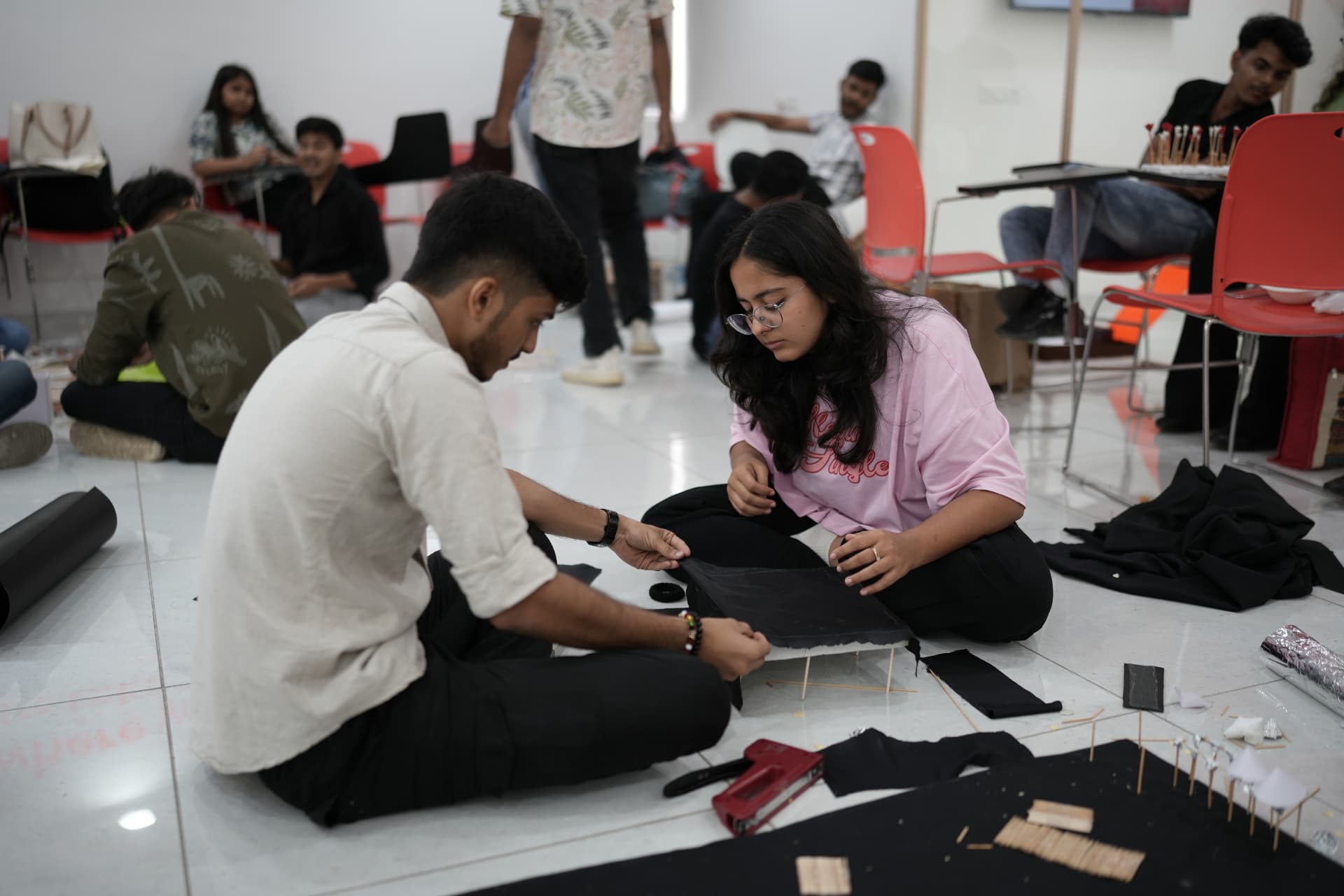 Students working on a fashion project at ADI Ahmedabad